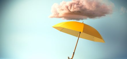 3D rendering of an umbrella under a stormy cloud